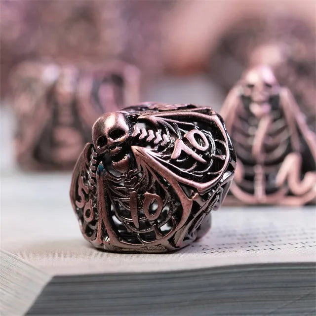 Hollow human bone metal dice set