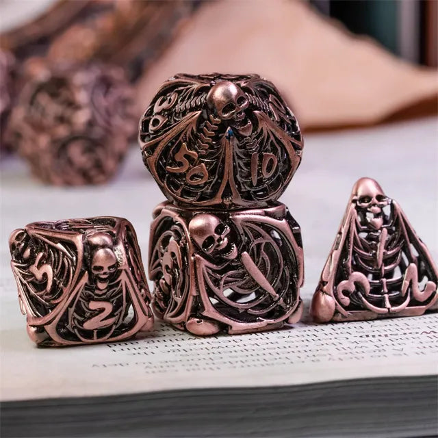 Hollow human bone metal dice set