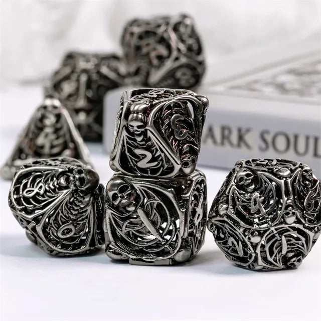 Hollow human bone metal dice set