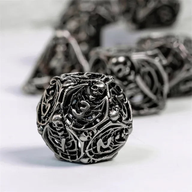 Hollow human bone metal dice set